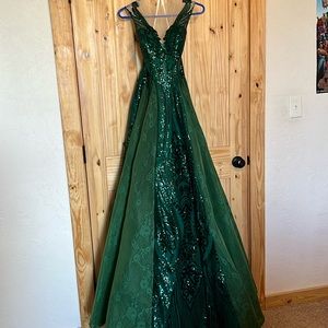 Green ball gown made in Singapore.